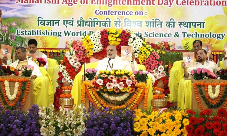 Brahmachari Girish Ji and other dignitaries releasing Maharishi World Peace Movement quarterly newsletter.