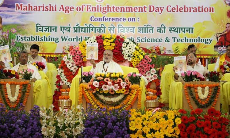 Brahmachari Girish Ji and other dignitaries releasing Maharishi World Peace Movement quarterly newsletter.